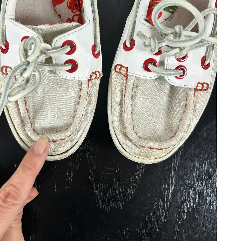 Preowned COACH boat shoe slip on- Sz 6M some overall wear- beige with red accent